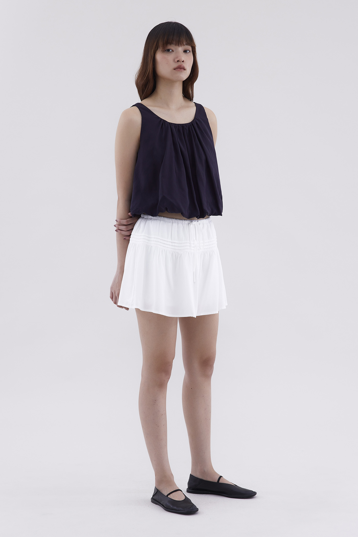 Dione Pin-Tuck Mini Skirt